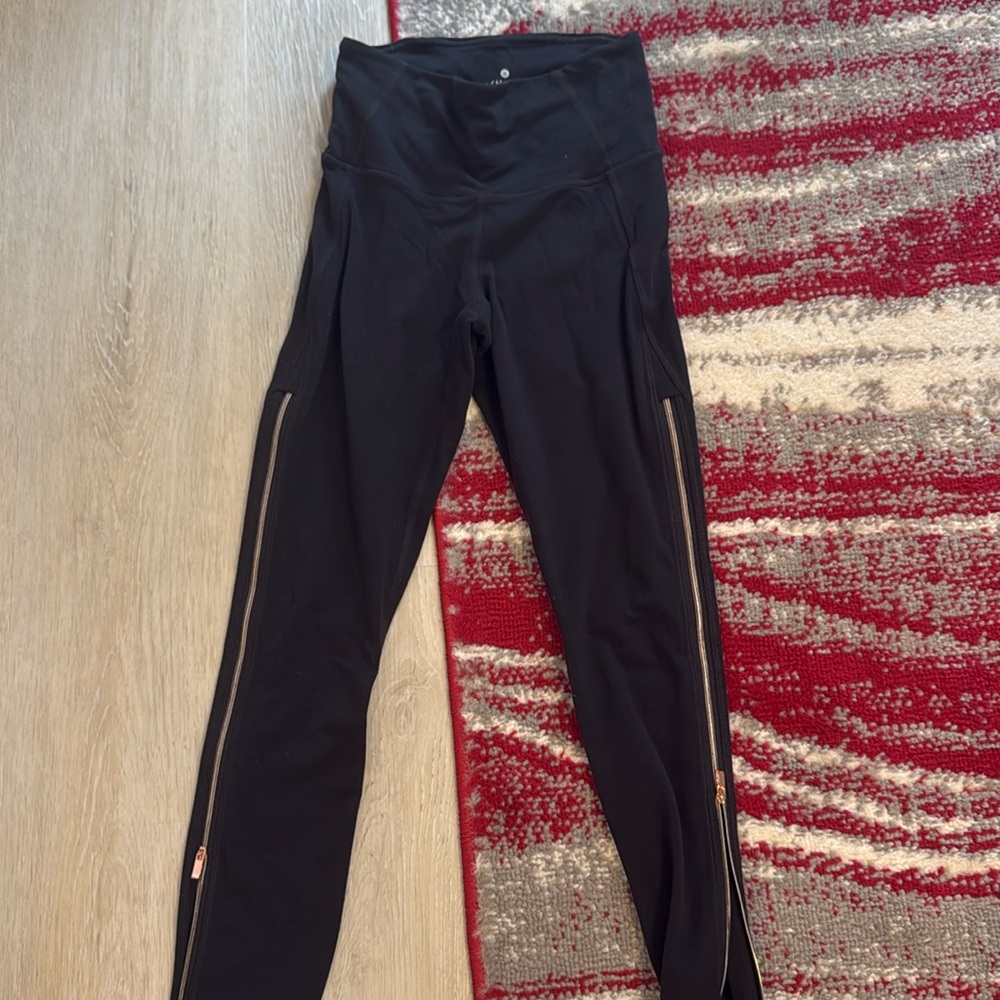 Athletes XXS black leggings with gold zippers